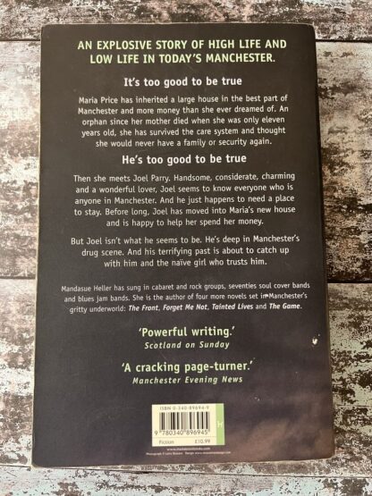 An image of a book by Mandasue Heller - The Charmer