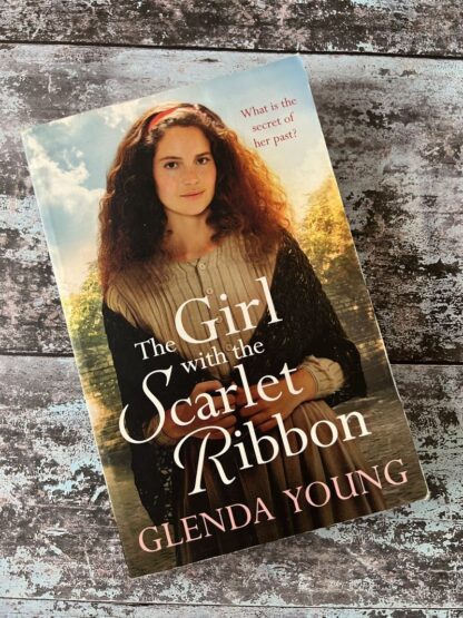 An image of a book by Glenda Young - The Girl with the Scarlet Ribbon