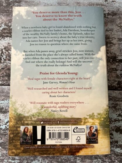 An image of a book by Glenda Young - The Girl with the Scarlet Ribbon