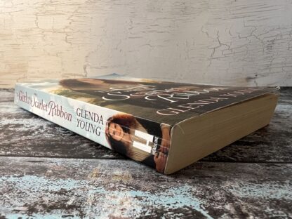 An image of a book by Glenda Young - The Girl with the Scarlet Ribbon