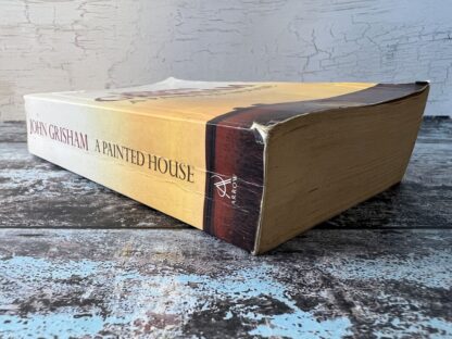 An image of a book by John Grisham - A Painted House