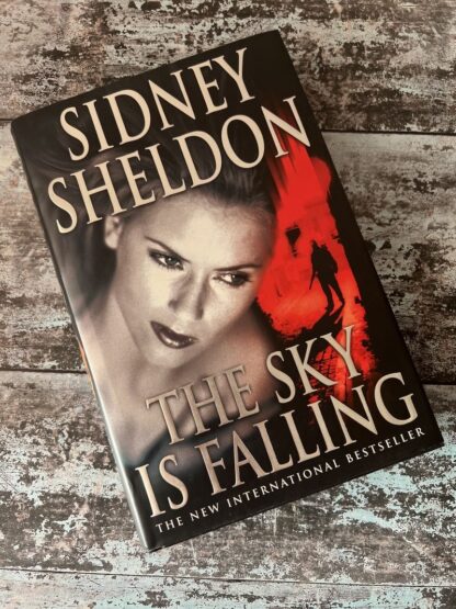 An image of a book by Sidney Sheldon - The Sky is Falling