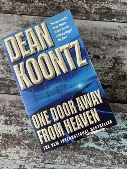 An image of a book by Dean Koontz - One Door Away From Heaven