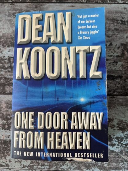 An image of a book by Dean Koontz - One Door Away From Heaven