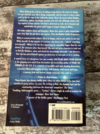 An image of a book by Dean Koontz - One Door Away From Heaven