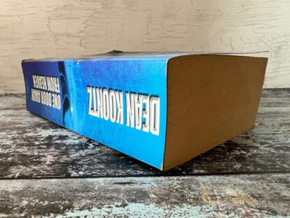 An image of a book by Dean Koontz - One Door Away From Heaven
