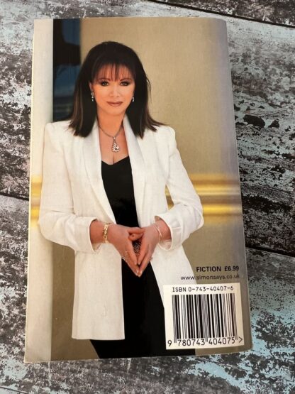 An image of a book by Jackie Collins - Hollywood Divorces