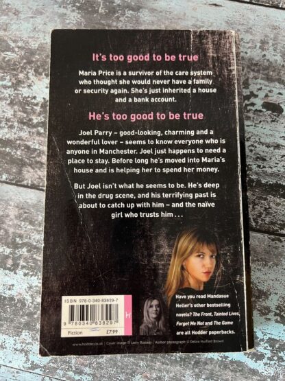 An image of a book by Mandasue Heller - The Charmer