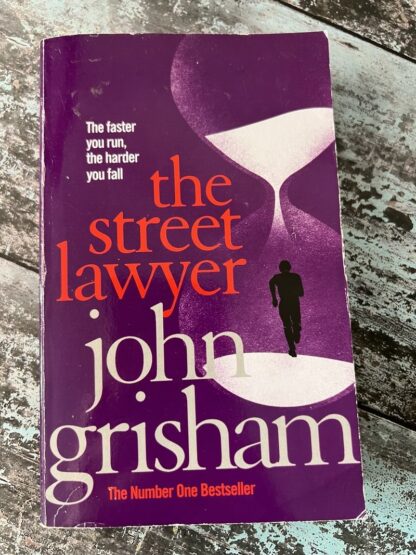 An image of a book by John Grisham - The Street Lawyer