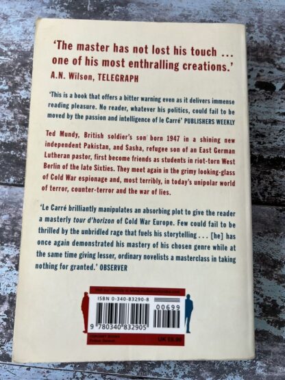 An image of a book by John le Carré - Absolute Friends