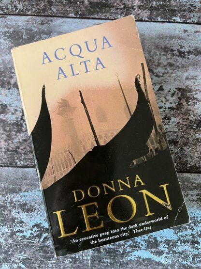 An image of a book by Donna Leon - Acqua Alta