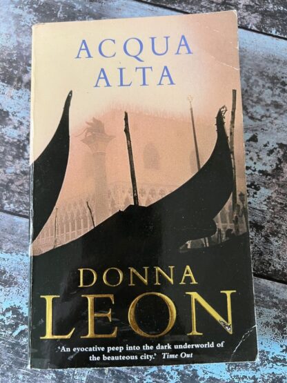 An image of a book by Donna Leon - Acqua Alta