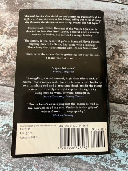 An image of a book by Donna Leon - Acqua Alta