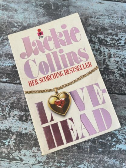 An image of a book by Jackie Collins - Love Head