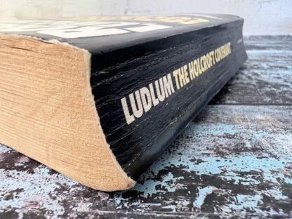 An image of a book by Robert Ludlum - The Holcroft Covenant