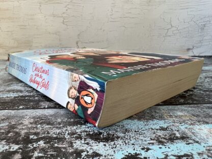 An image of a book by Maisie Thomas - Christmas with the Railway Girls