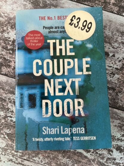 An image of a book by Shari Lapena - The Couple Next Door
