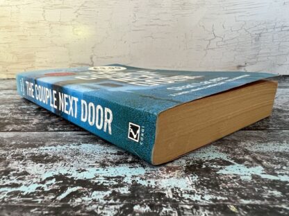 An image of a book by Shari Lapena - The Couple Next Door