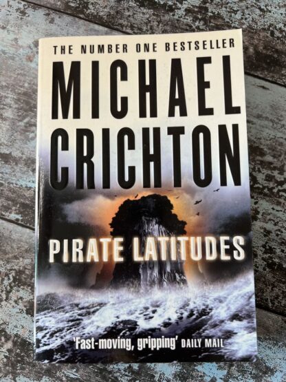 An image of a book by Michael Crichton - Pirate Latitudes