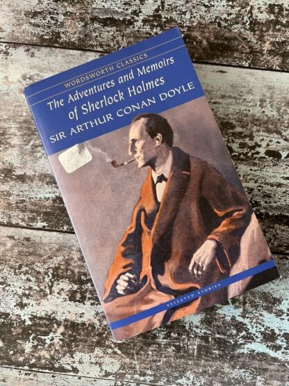 An image of a book by Sir Arthur Conan Doyle - The Adventure and Memoirs of Sherlock Holmes