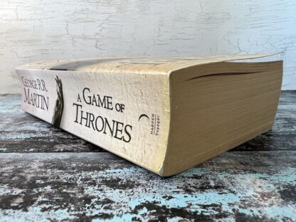 An image of a book by George R R Martin - A Game of Thrones