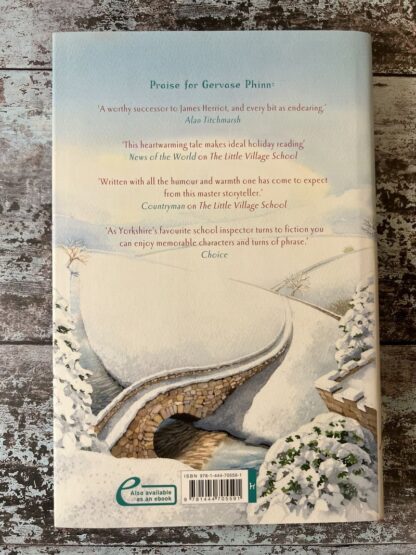 An image of a book by Gervase Phinn - Trouble at the Little Village School