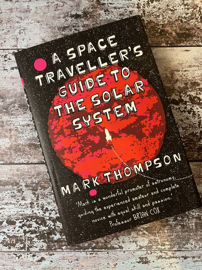 An image of a book by Mark Thompson - A Space Traveller's Guide to the Solar System