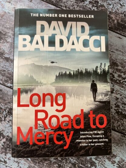 An image of a book by David Baldacci - Long Road to Mercy