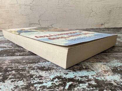An image of a book by Nicola May - The corner shop in cockleberry bay