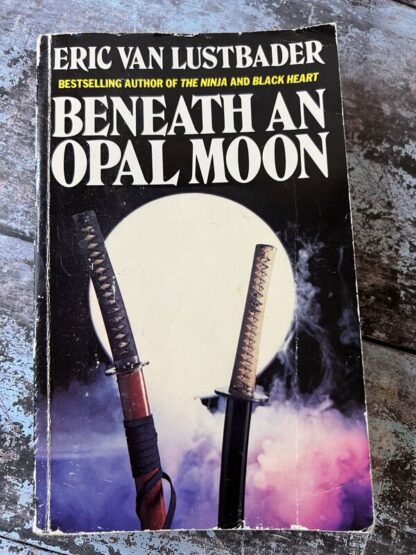 An image of a book by Eric Van Lustbader - Beneath an opal moon