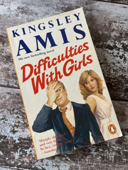 An image of a book by Kingsley Amis - Difficulties with girls