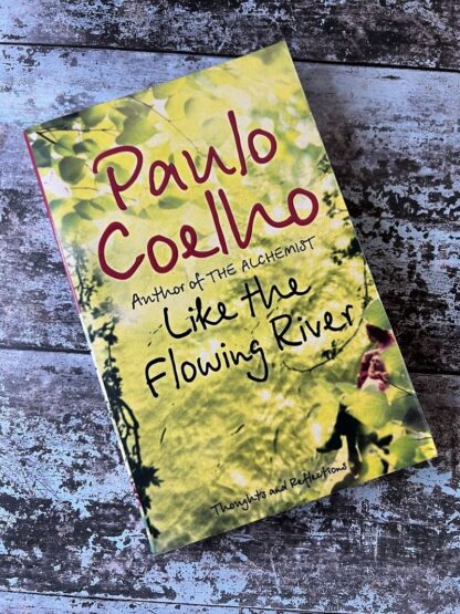 An image of a book by Paulo Coelho - Like the flowing river