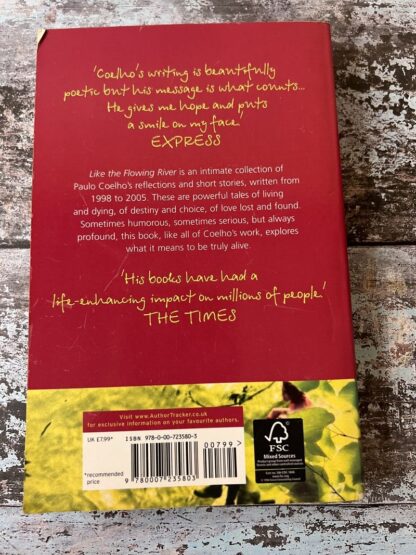 An image of a book by Paulo Coelho - Like the flowing river