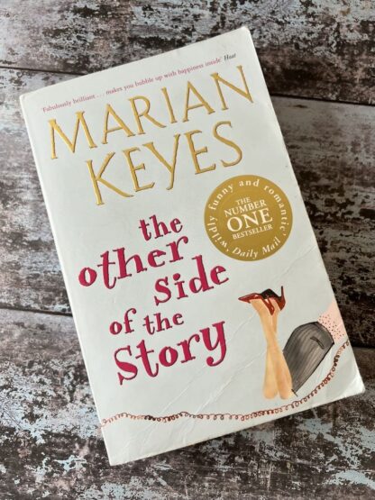 An image of a book by Marian Keyes - The other side of the story