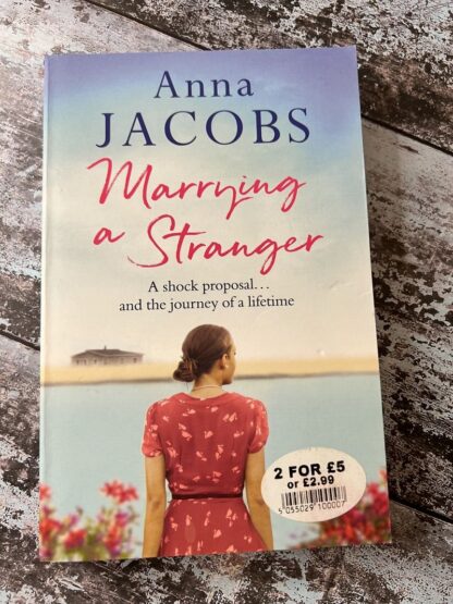 An image of a book by Anna Jacobs - Marrying a stranger