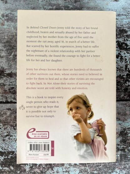 An image of a book by Jenny Tomlin - Not Alone
