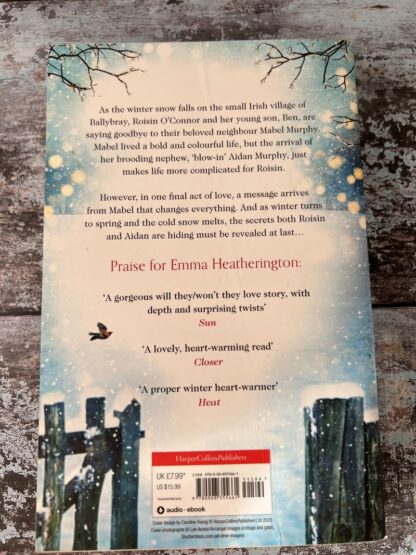 An image of a book by Emma Heatherington - Secrets in the Snow