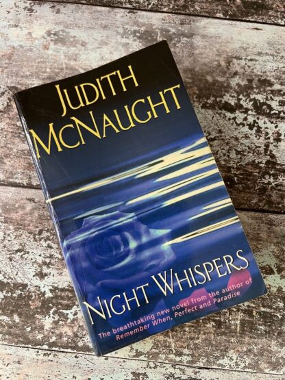 An image of a book by Judith McNaught - Night Whispers