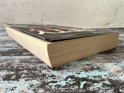 An image of a book by Steve Cavanagh - Fifty Fifty