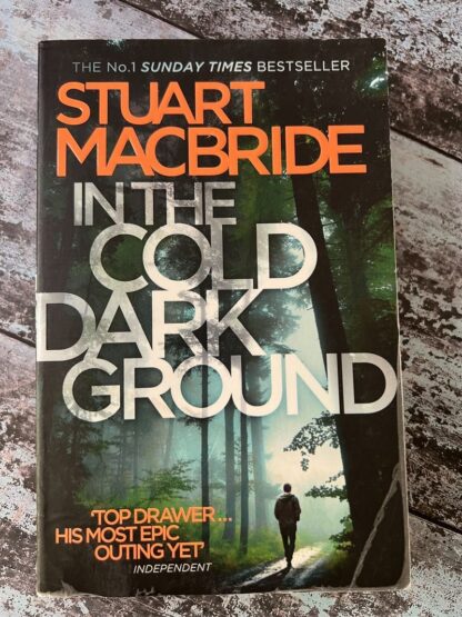An image of a book by Stuart Macbride - In the cold dark ground