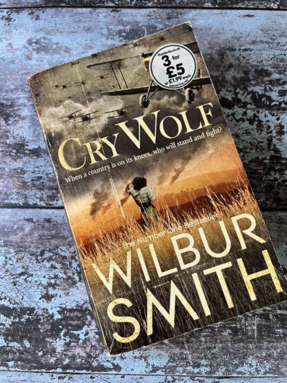 An image of a book by Wilbur Smith - Cry Wolf