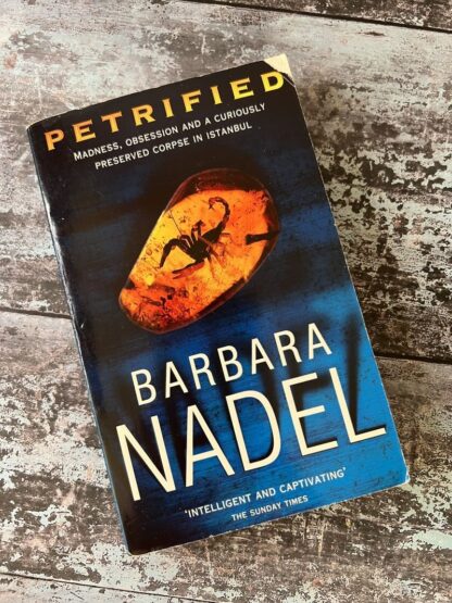 An image of a book by Barbara Nadel - Petrified