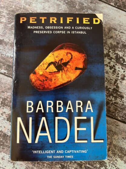 An image of a book by Barbara Nadel - Petrified