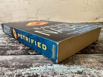An image of a book by Barbara Nadel - Petrified