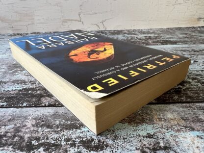 An image of a book by Barbara Nadel - Petrified
