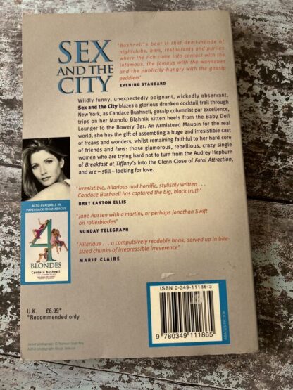 An image of a book by Candace Bushnell - Sex and the City