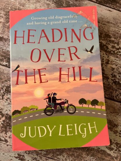 An image of a book by Judy Leigh - Heading Over the Hill