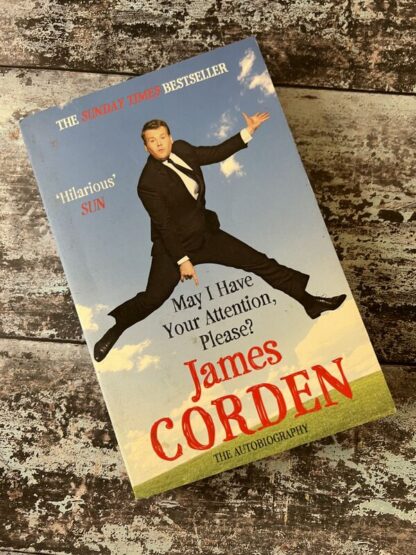 An image of a book by James Corden - May I have your attention please?