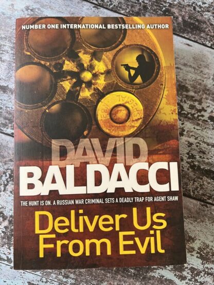 An image of a book by David Baldacci - Deliver Us from Evil