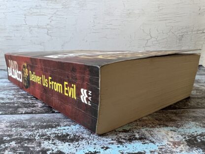 An image of a book by David Baldacci - Deliver Us from Evil